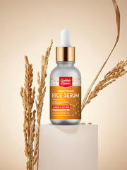 Bottle of Golden Bear Brightening Rice Serum with rice grains on a beige background